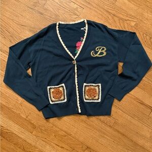 Disney’s Belle rose crochet cardigan